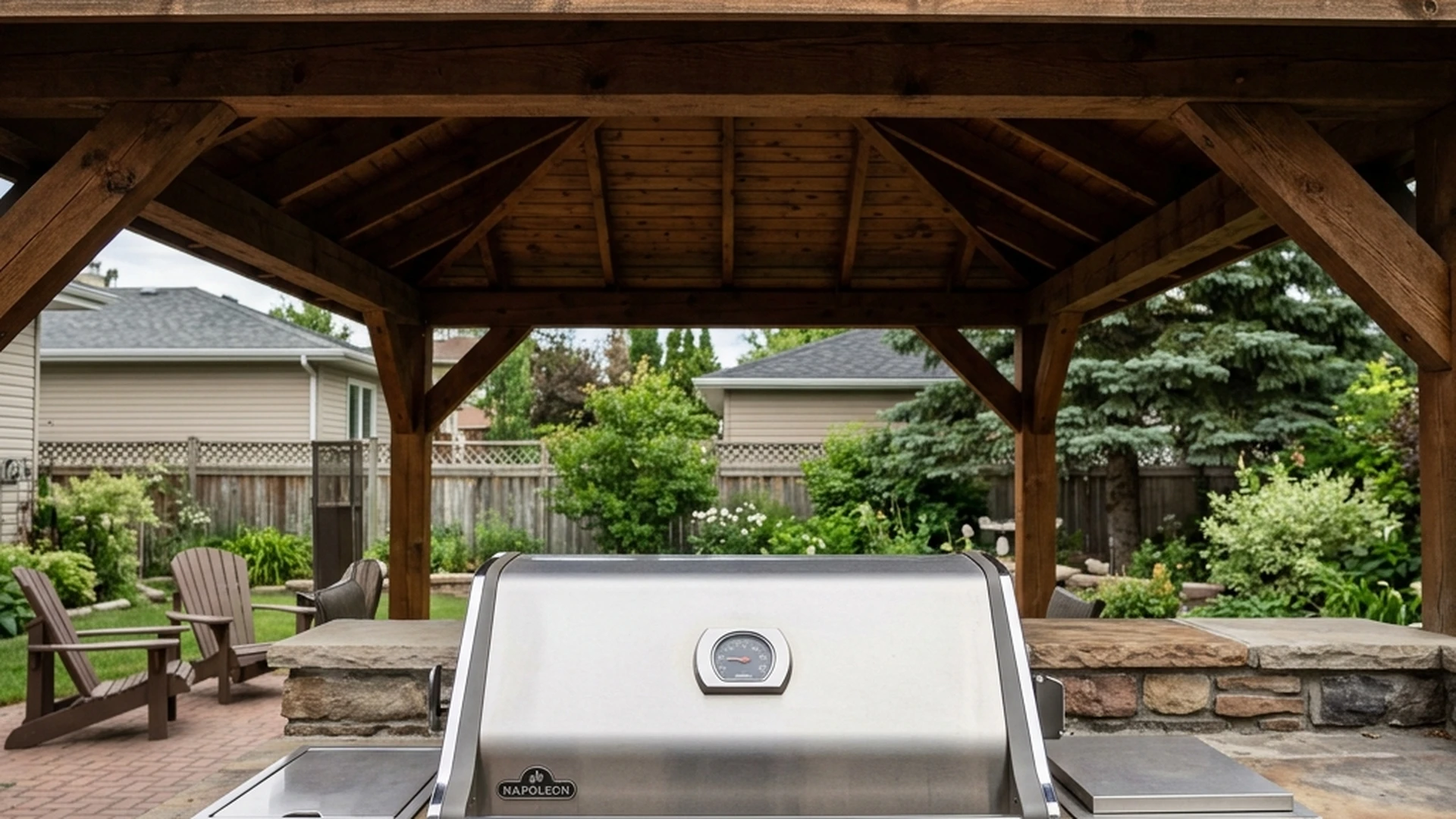 Close up of gas grill clearance under pavilion roof structure at Winnipeg outdoor kitchen showing proper vertical spacing