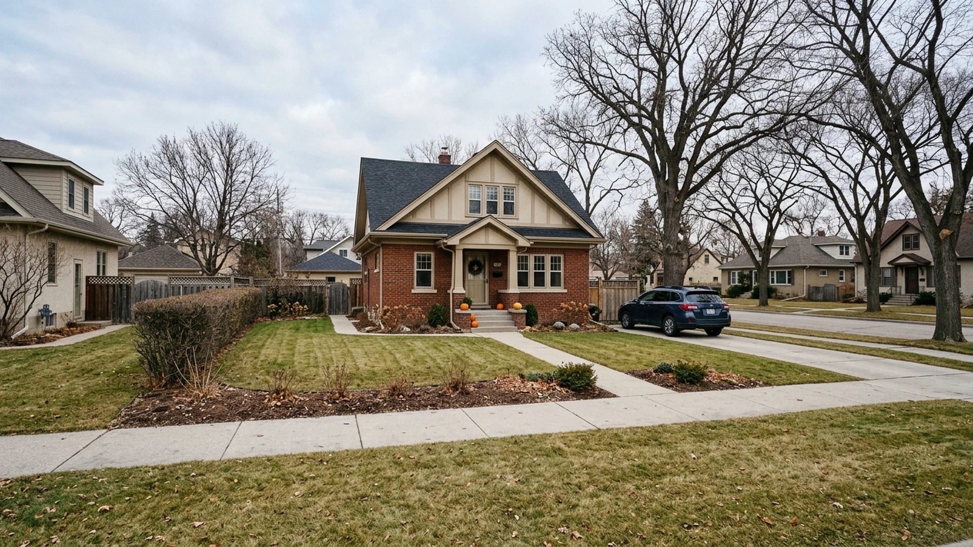 Cleared Winnipeg residential lawn and garden beds after completed fall cleanup with perennials cut back